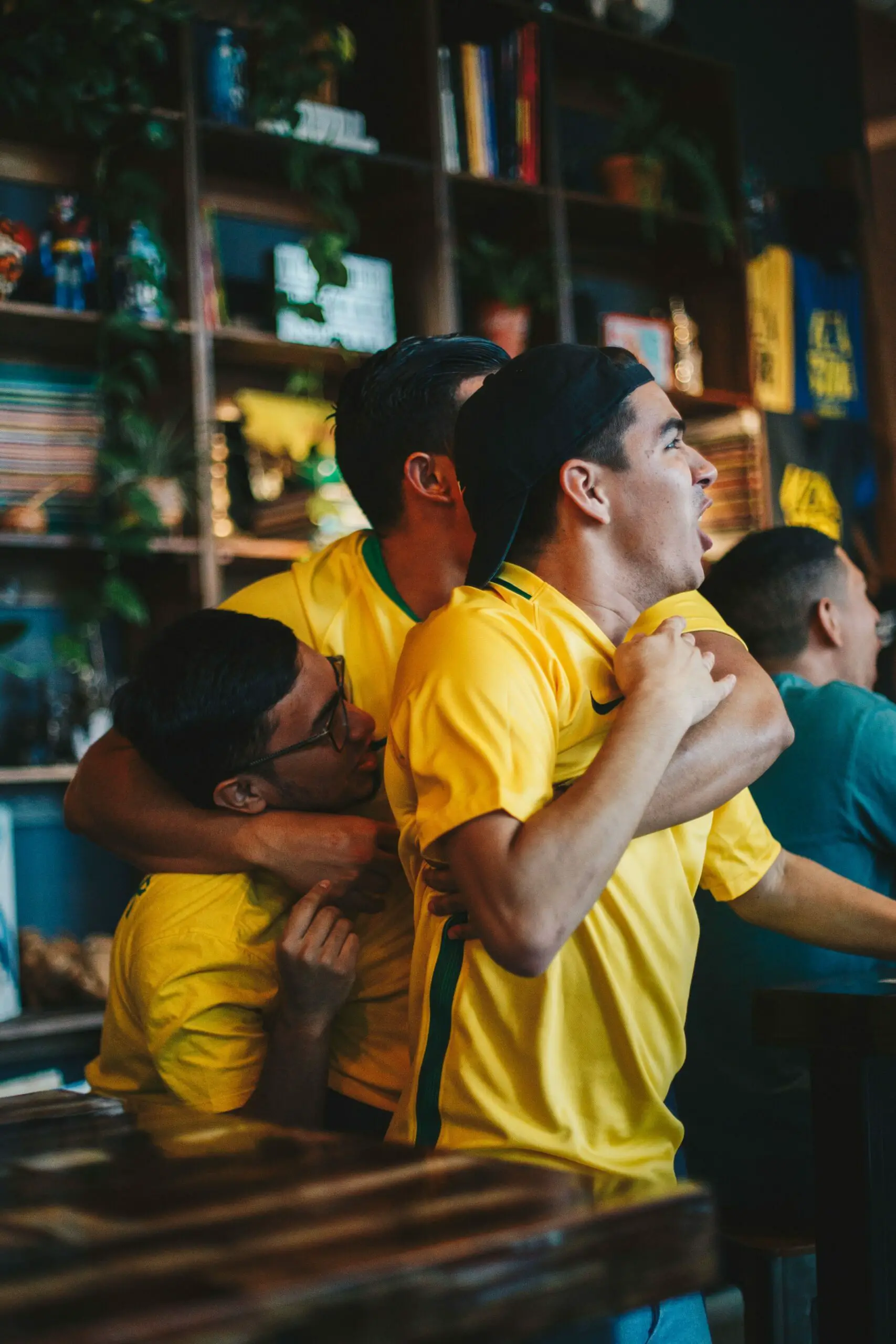 Photo by ELEVATE: https://www.pexels.com/photo/three-men-wearing-yellow-shirt-embracing-each-other-1267295/