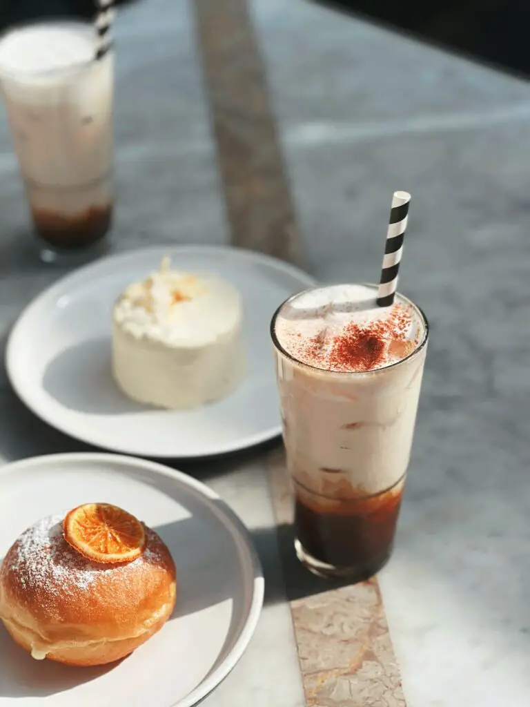 Sweet Cream Donuts Coffee and Smoothies <a href="https://unsplash.com/photos/wzBXAMG4j34?utm_source=unsplash&utm_medium=referral&utm_content=creditShareLink/">Photo Source</a>