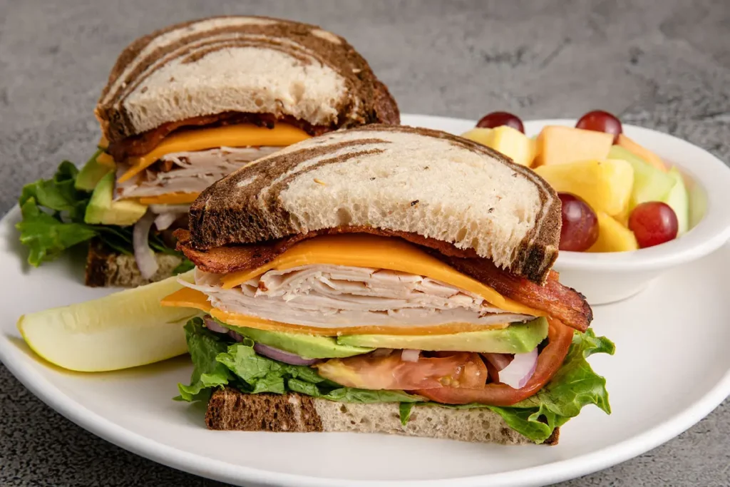 Miracle Mile Deli - <a href="https://miraclemiledeli.com/food/">Photo Source</a>