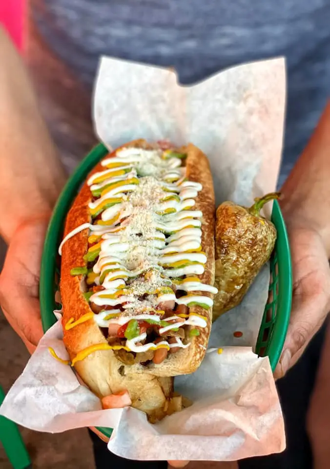 Sonoran Hot Dog @ Emilio’s Tacos & Hotdogs - <a href="https://www.facebook.com/EmiliosPhx/photos/pb.100076179093979.-2207520000/1919033558255786/?type=3">Photo Source</a>
